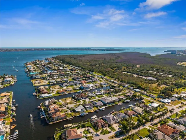 Aerial view featuring a residential view and a water view