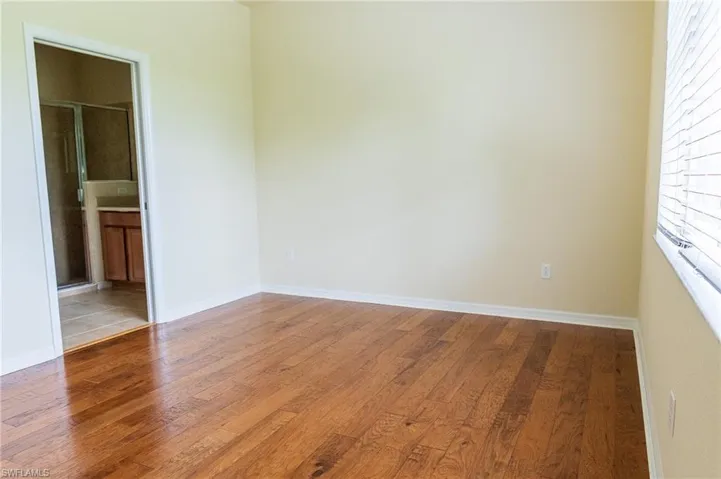 Full bath featuring vanity, toilet, shower / bath combination, and tile patterned flooring