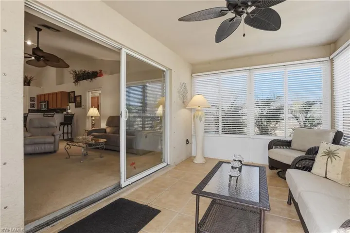 Sunroom with tile patterned flooring