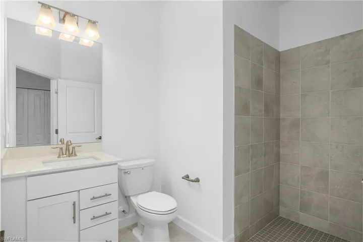 Ensuite Bath with walk-in shower in guest bedroom.