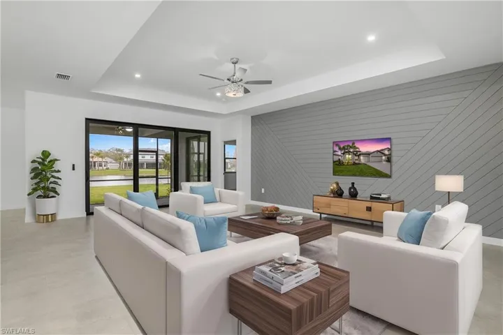 Open Floor plan is inviting and perfect for entertaining guests. Furniture digitally added.