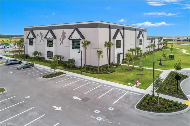 Indoor sports center includes a huge fitness center, tennis and pickleball courts, full court basketball, and on-site dining.
