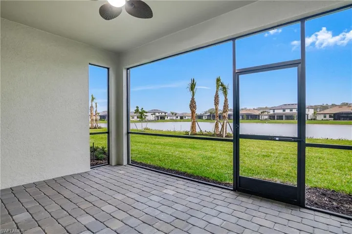 Relax outdoors and enjoy water views on your private screened lanai.