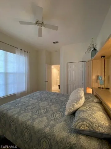 Bedroom featuring a closet and ceiling fan