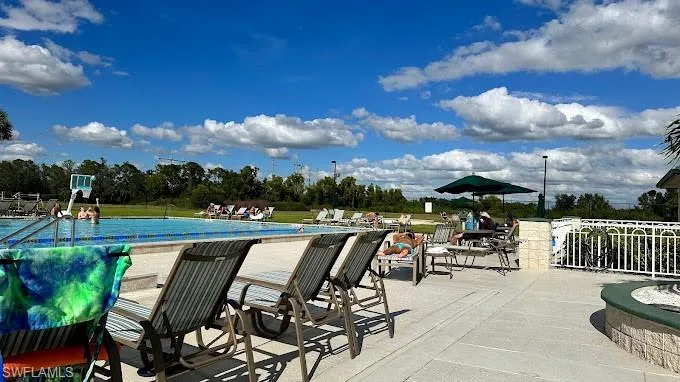 Gateway Community swimming pool featuring a patio