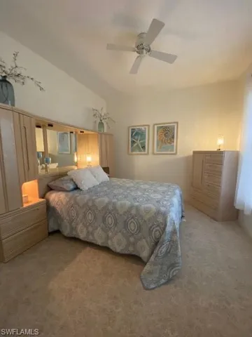 Bedroom featuring carpet and ceiling fan