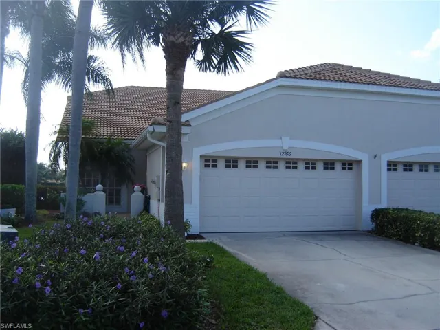 View of front facade featuring a two-car garage