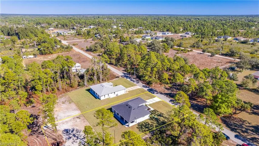 Large half-acre lot outlined in yellow.