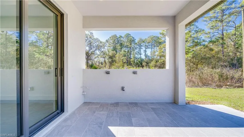 Open lanai - ready for your outdoor kitchen! Plumbing & electrical already installed!