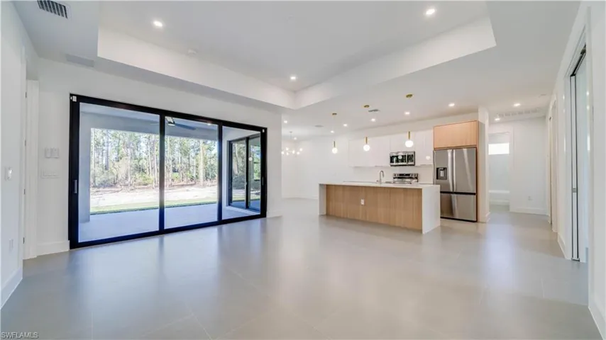 Open Floorplan, expansive 8' sliding doors, high tray ceilings, gorgeous views!