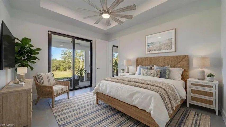 Virtually staged primary bedroom. Your own indoor sanctuary!