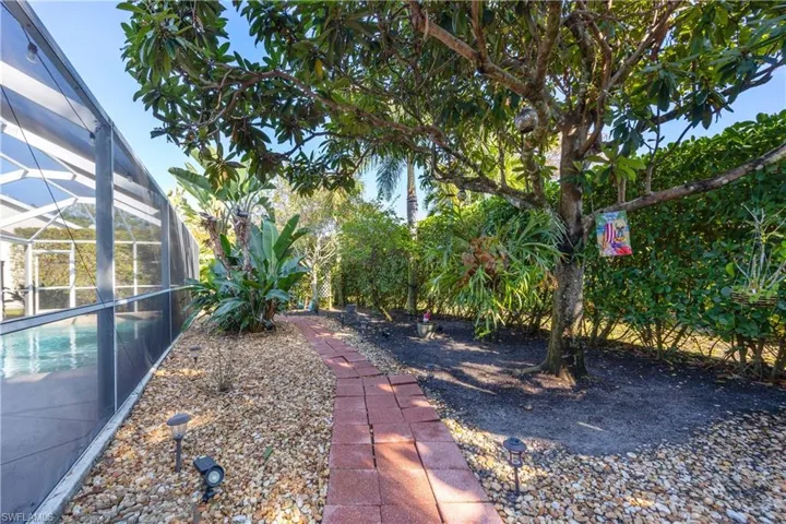 View of yard featuring rear lanai