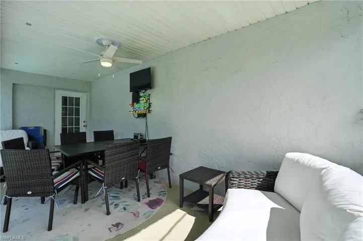 Swimming pool featuring a patio area and a grill