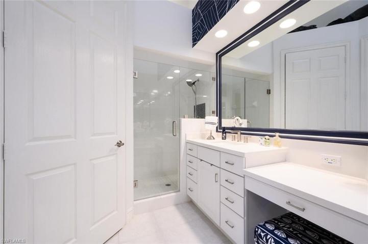 Master Bathroom with Custom Mirror, Quartz Counter Tops, Walk-In Tile Shower and Separate Water Closet