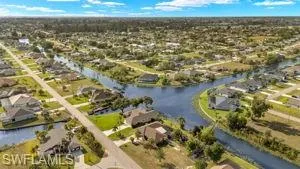 Bird's eye view with a residential view and a water view