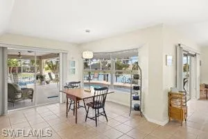 Dining room featuring light tile patterned floors