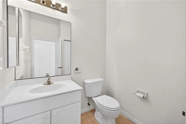 Bathroom featuring vanity and light tile patterned floors