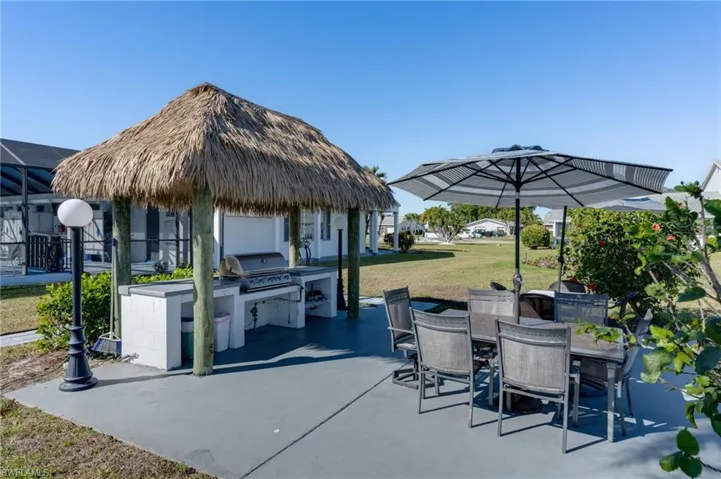 View featuring an outdoor kitchen/BBQ grill, and  gazebo
