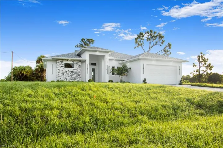 View of front of property with a garage
