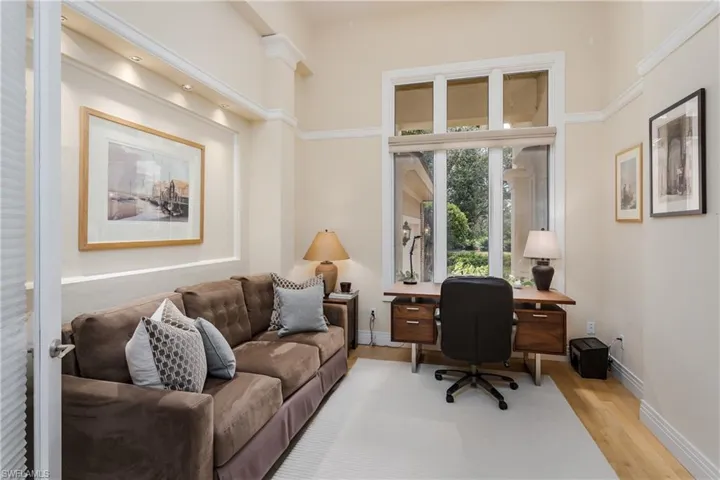 Office with light wood finished floors and baseboards