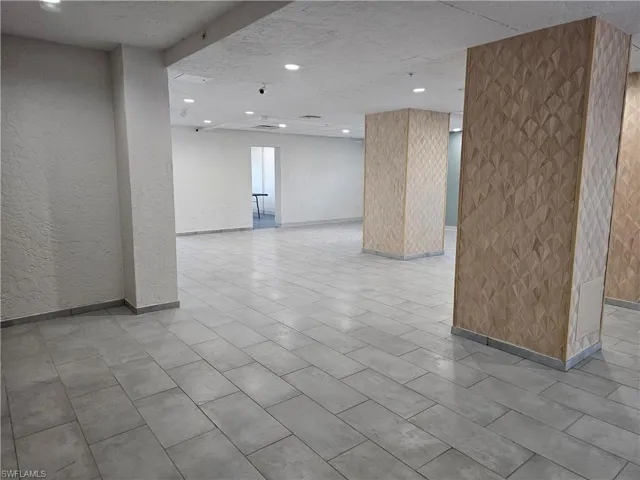 Spare room featuring a textured ceiling