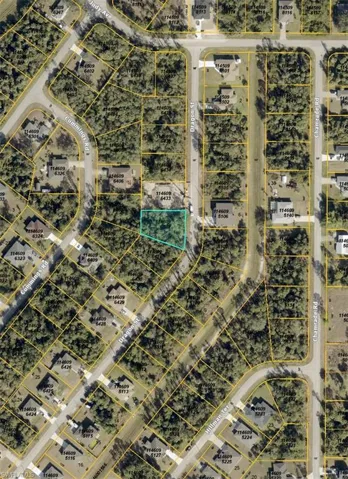 Aerial map of property and surrounding area featuring property boundaries highlighted