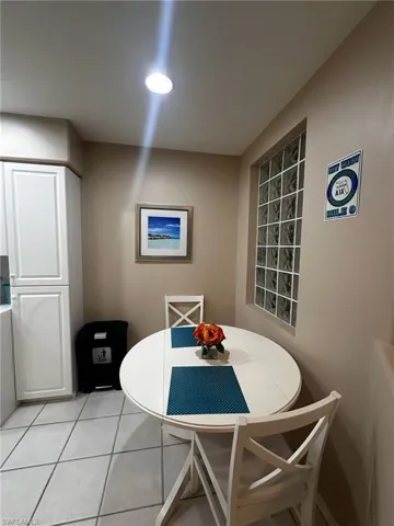Dining room featuring light tile patterned floors