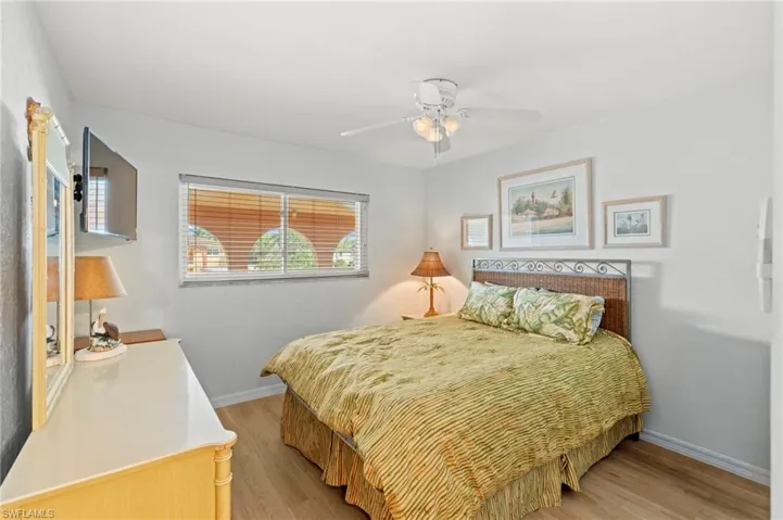 Bedroom featuring light wood-style flooring and ceiling fan