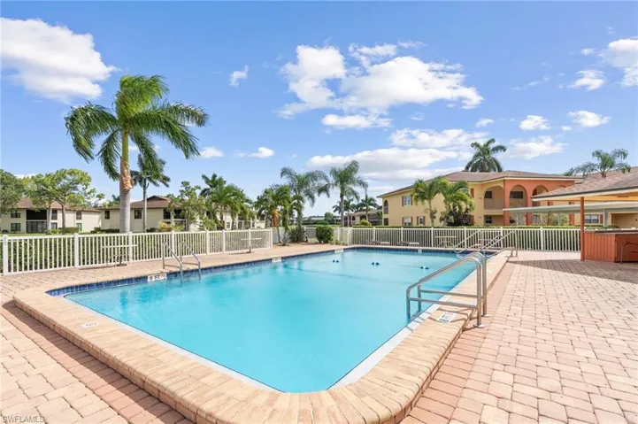 Community pool with a patio area