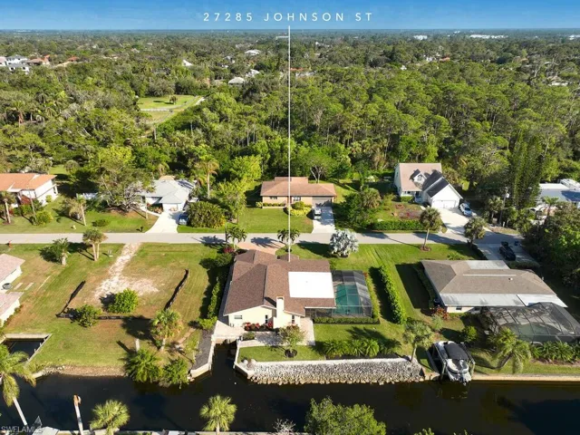 WOW...a pool home with Gulf Access THIS close to Downtown Bonita!