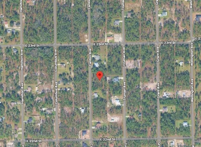 Aerial overview of property's location featuring property parcel outlined