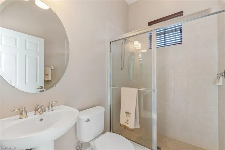 Bathroom nearest to back right bedroom and back exterior door.