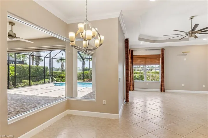 Nook with mitered glass overlooking patio/pool.