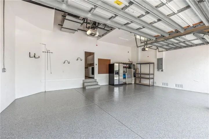 Fresh expoxy floor in this 3-car garage.