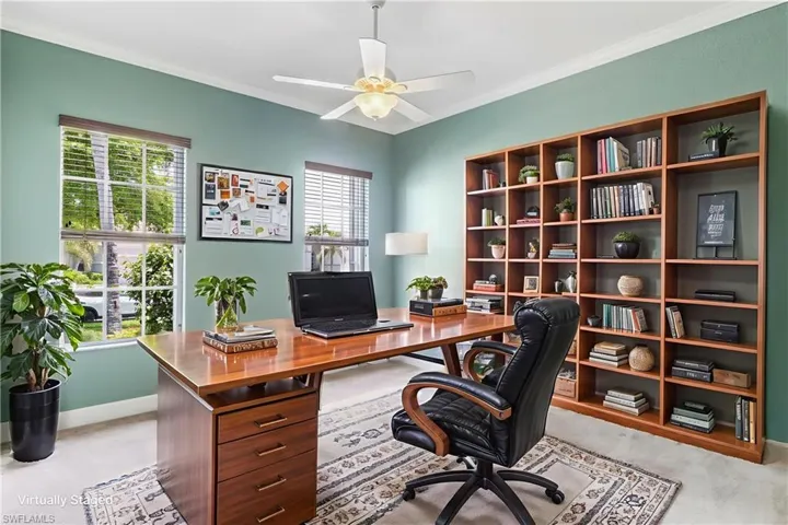 Virtually staged Front Room used as an office though could be a bedroom.