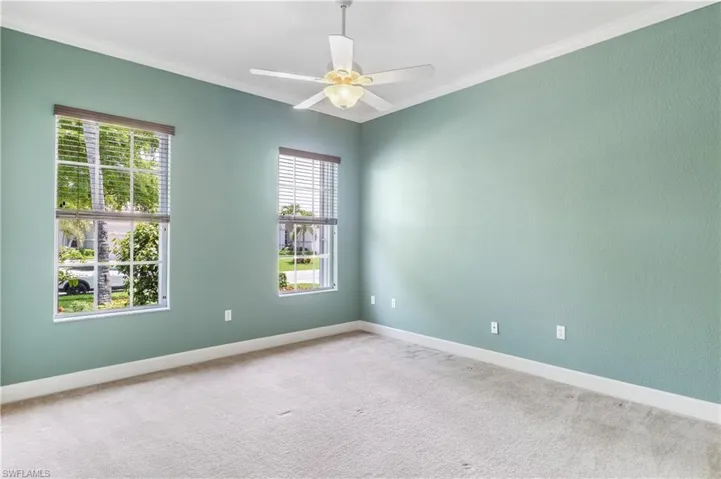 Front room with lots of versatility.  Office, Bedroom and space for closet.