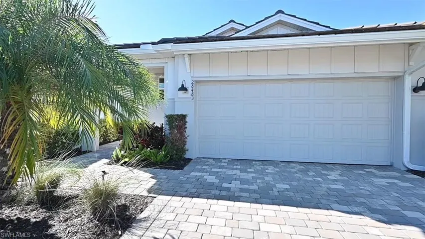 Garage with decorative driveway