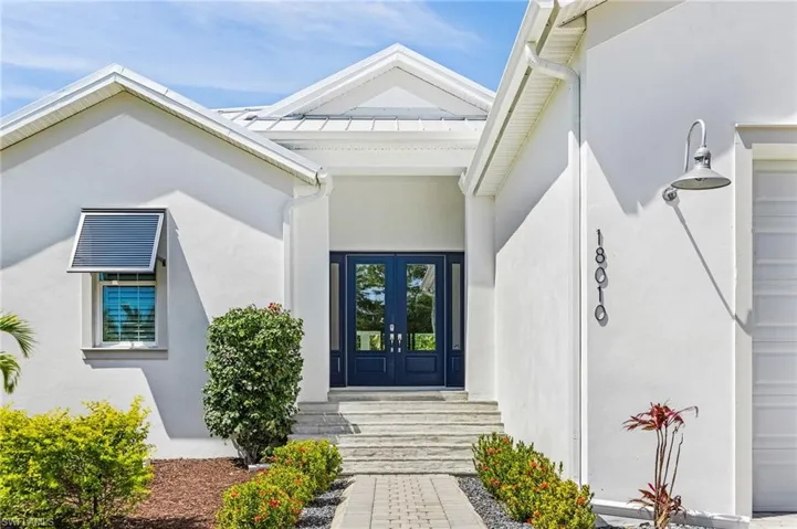 Doorway to property with french doors