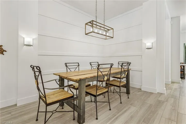 Dining room with light hardwood / wood-style floors