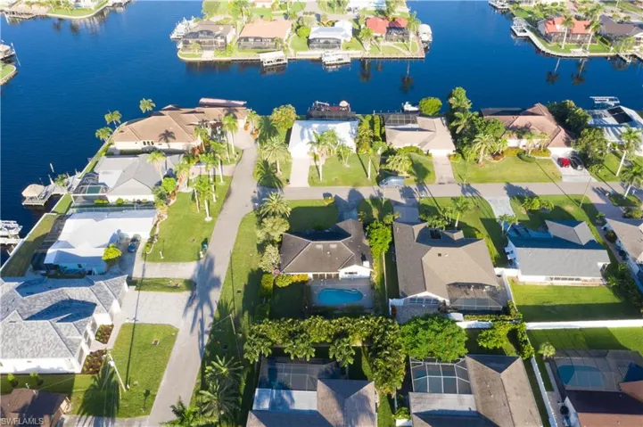Aerial view of residential area with a nearby body of water