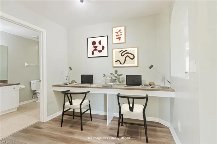 Office area with built in desk