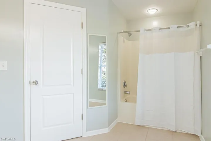 Primary Bathroom with walk in closet