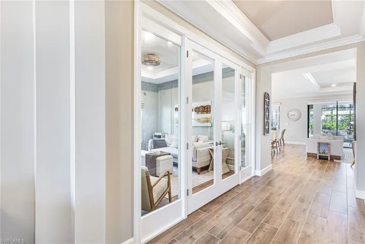 Foyer hallway to flex room with French glass doors