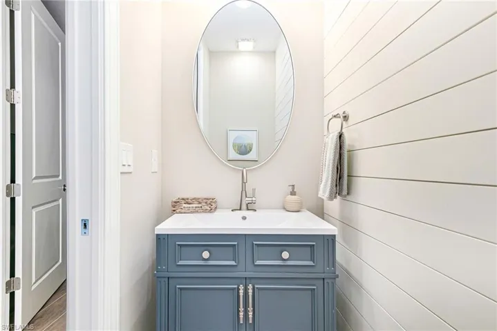 Guest half bathroom with shiplap detail