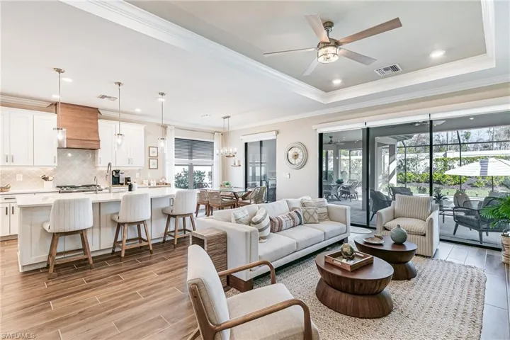 Open concept living room, kitchen & dining