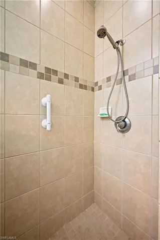 Bathroom with tiled shower