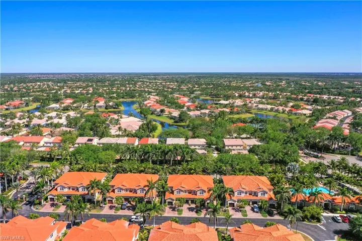 Drone / aerial view featuring a residential view and a water view