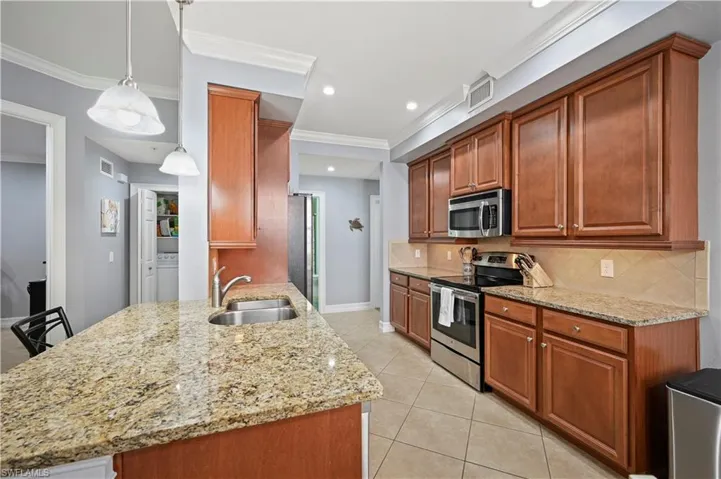 Kitchen featuring appliances with stainless steel finishes