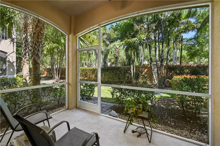 Lanai with landscaped view and Privacy wall