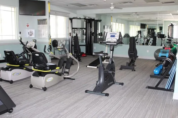 Workout area featuring a paneled ceiling